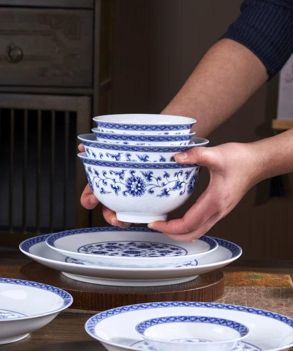 Jingdezhen blue and white porcelain tableware set, ceramic bowl with lotus scroll design, high-temperature underglaze decoration, retro Chinese style, household rice bowl.